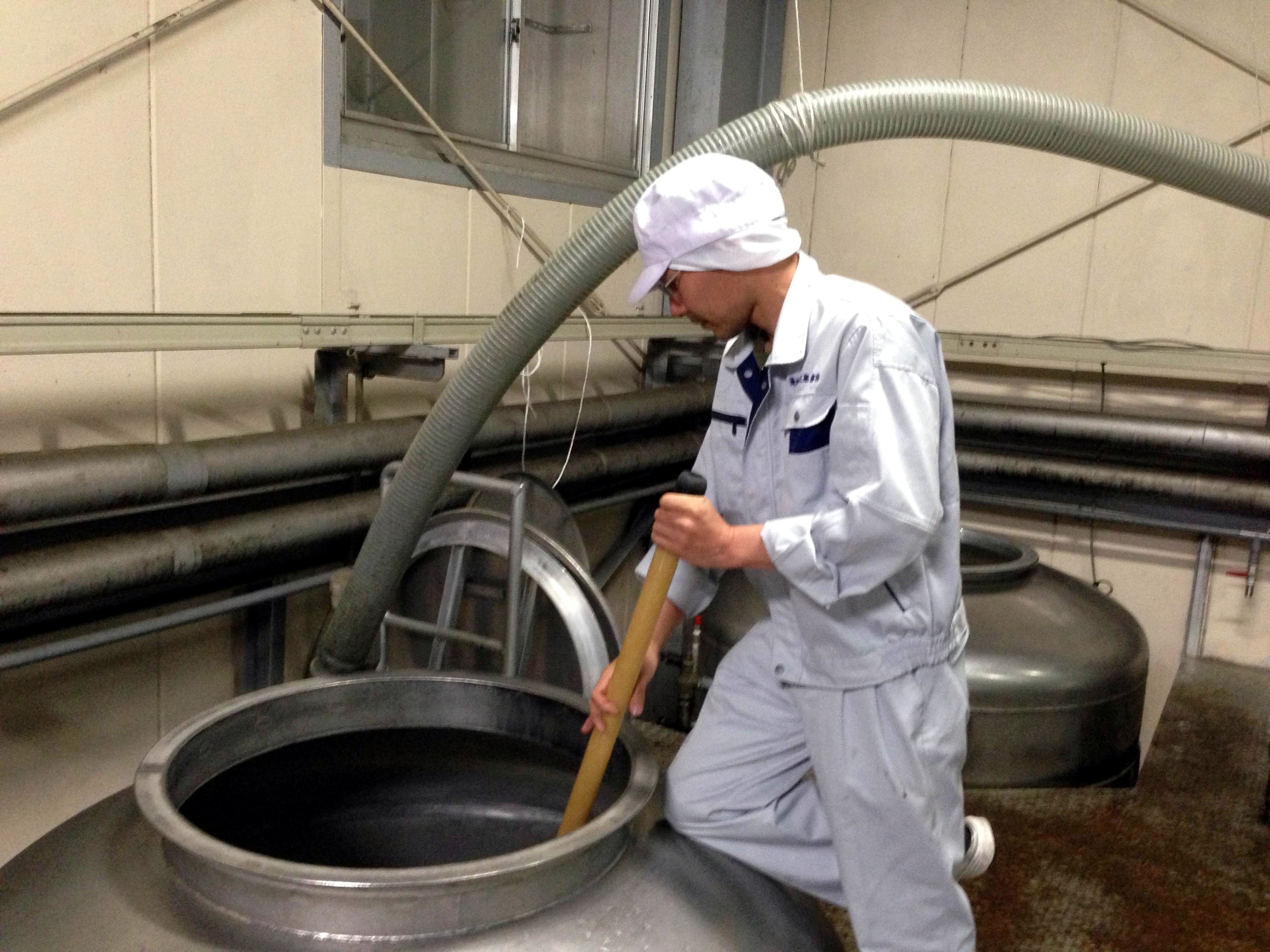 Zaku brewmaster brewing sake